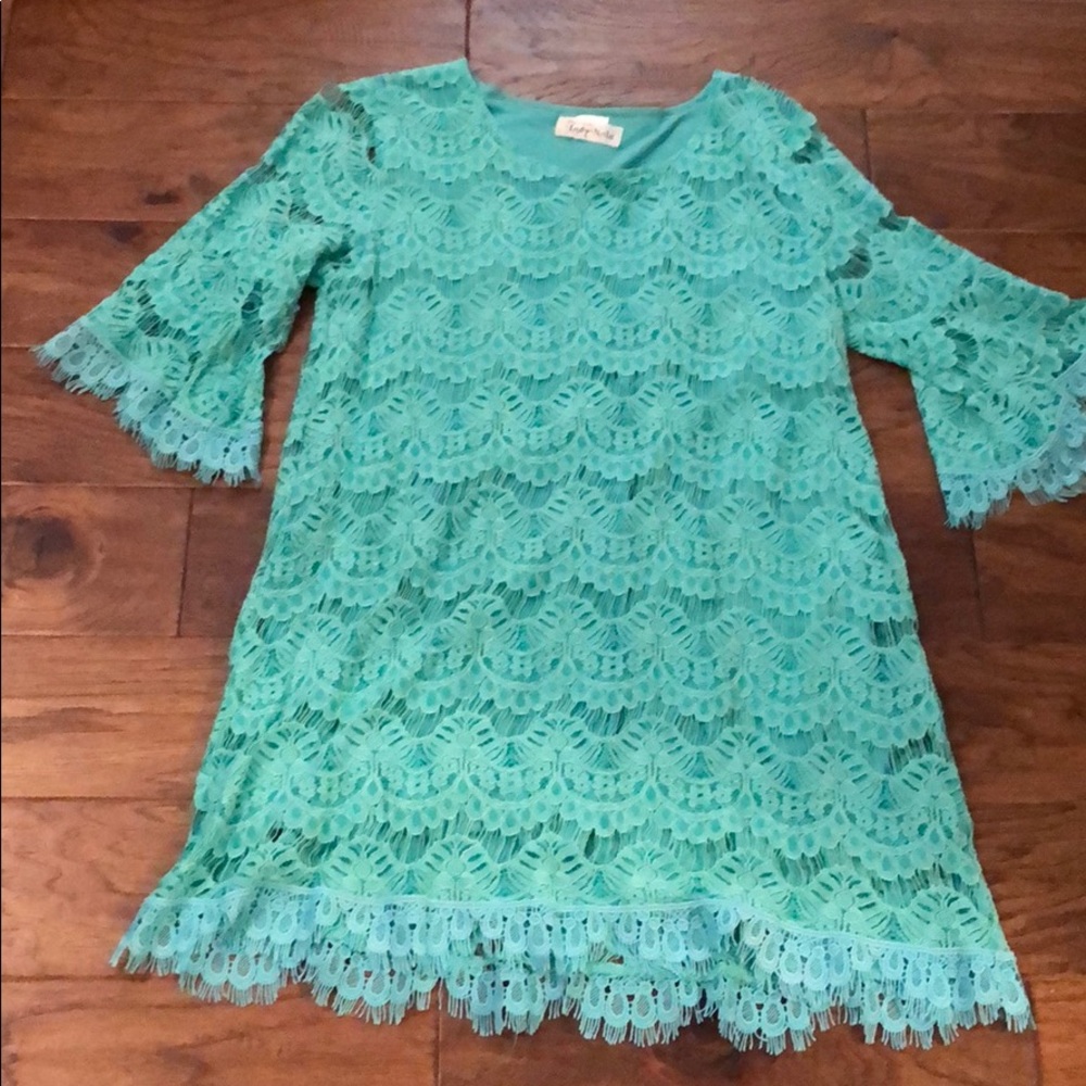 Teal lace dress/tunic worn once size small.